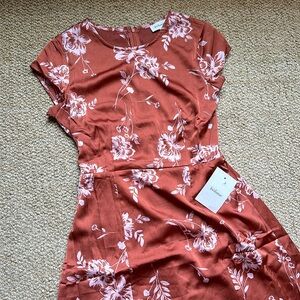 Large Modest Bohme Maxi Dress in Rust with pale pink flowers.